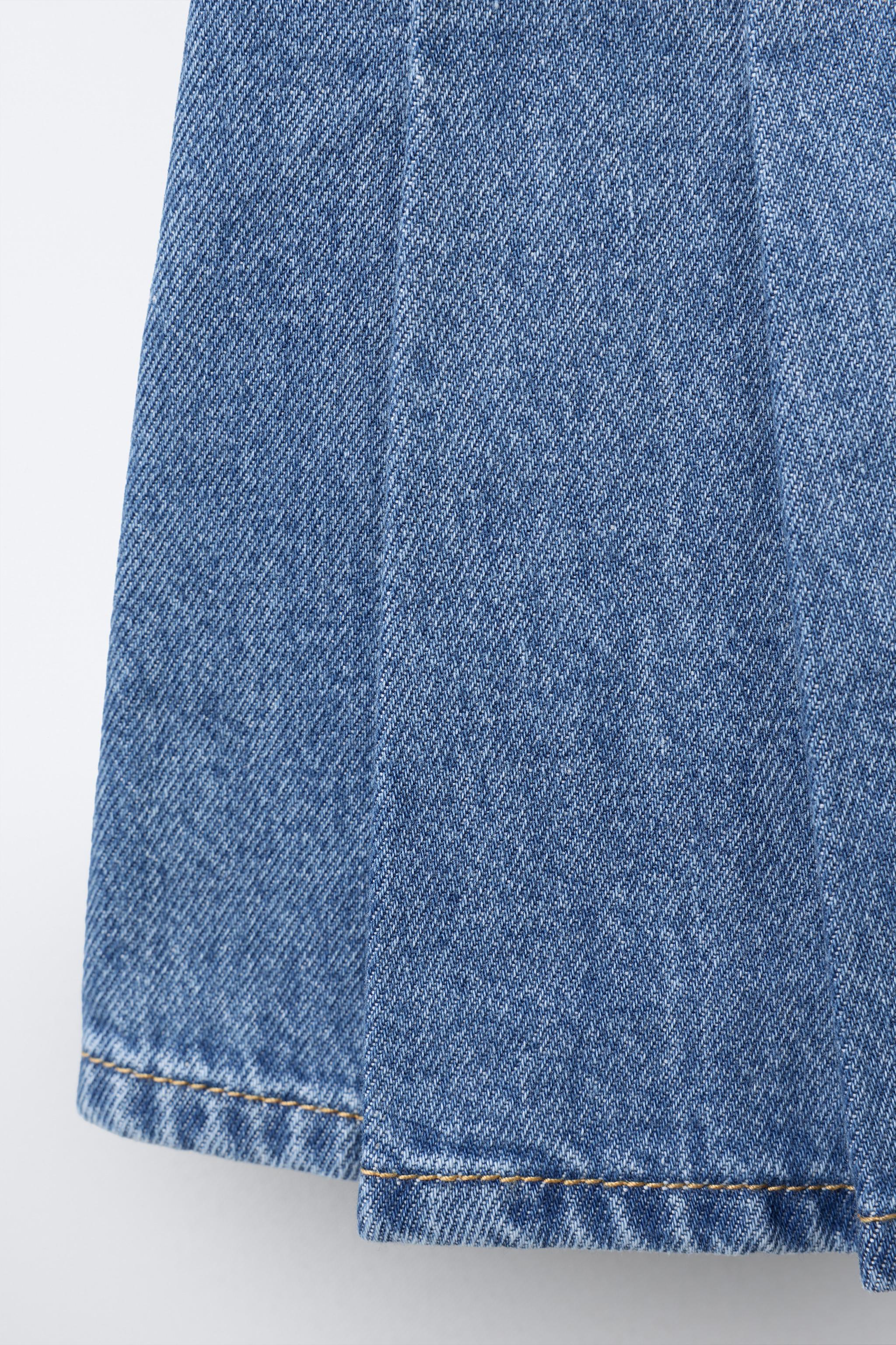 PLEATED DENIM SKIRT WITH BOWS